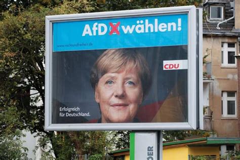 Support for Merkel's bloc hits record low, AfD at new high: Poll