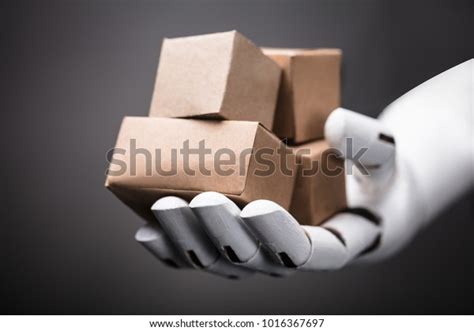 Robot in Hand Cartoon Box 的图像结果