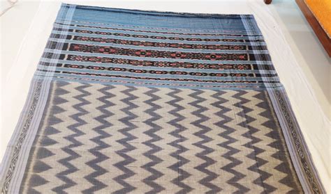 This garment has been woven, in the interiors of India, on a handloom ...