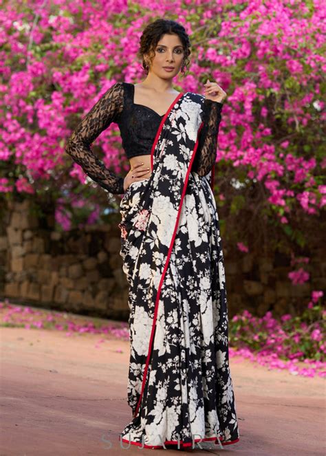Trendy black floral printed cotton saree highlighted with overall bead ...