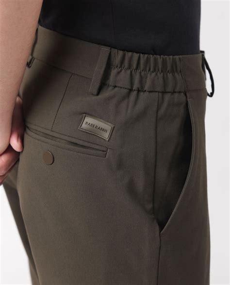 Rare Rabbit Men's Travellers Dark Olive Solid Mid-Rise Regular Fit Tro