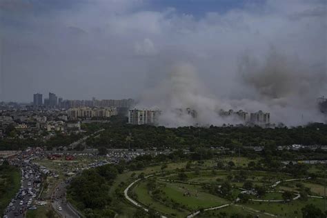 Plumes of dust as India demolishes illegal skyscrapers- The Etimes ...