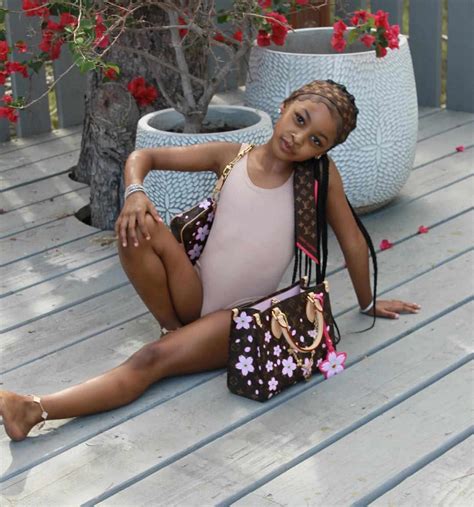 Cardi B Shares First Full Photo of Daughter Blossom, Along with New ...