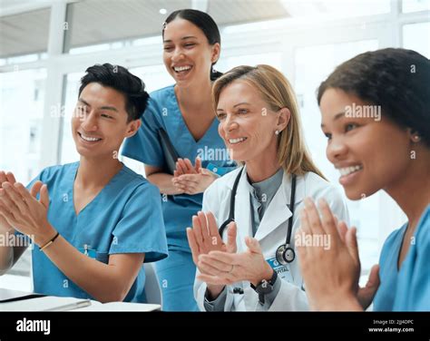 Every achievement deserves an applause. a group of doctors clapping ...