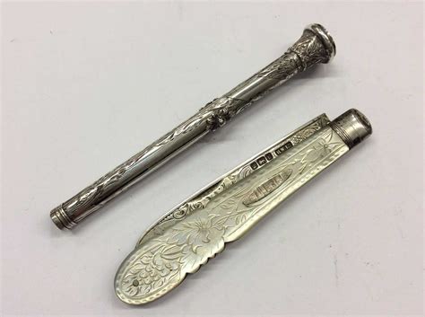 Lot 717 - Victorian white metal propelling pen/pencil