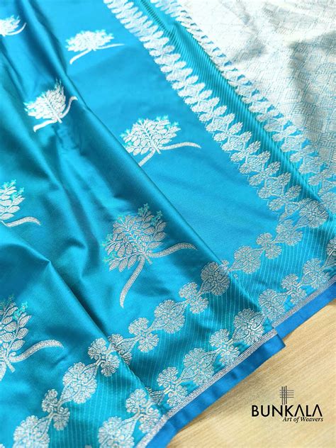 Shop Ocean Blue Leaf Buta Weaved Banarasi Mashru Silk Saree – BUNKALA