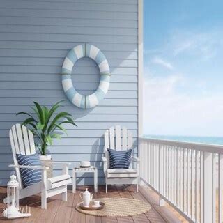 Contemporary Balcony Design with Blue Accent Wall and Stylish Furnishings