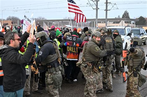 Anti-ICE protesters assemble across the US after shootings in ...