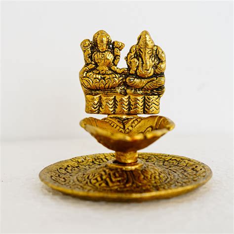 Ganesha Lakshmi Hand Diya Golden Gillet Metal | Culturati