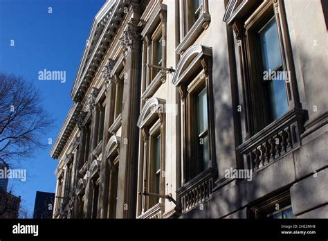 Aged building facade with windows Stock Photo - Alamy