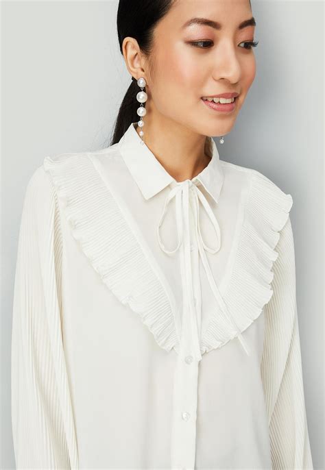 Buy Women Solid Tie-Up Neck Top Online at just Rs. 899.0 ...