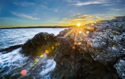 Download wallpaper sea, the sun, rays, glare, stones, shore, section ...
