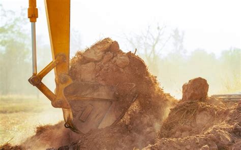 Image result for Backhoe Digging Hole