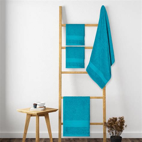 Buy PORTICO Eva Blue Textured Cotton Towel Set - Set of 4 from Portico ...