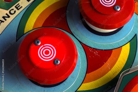 Red bumpers on a retro pinball machine Stock Photo | Adobe Stock