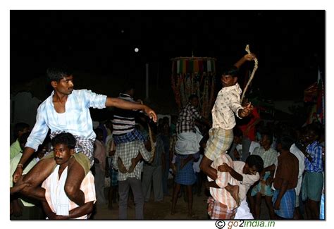 go2india.in : Hitting the hands of a person with rope during the festival