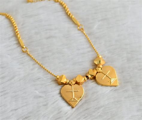Gold tone 24 inches rope chain with heart cross mangalyam dj-43905 ...