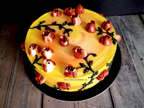 Yellow Anniversary Cake with buttercream flowers