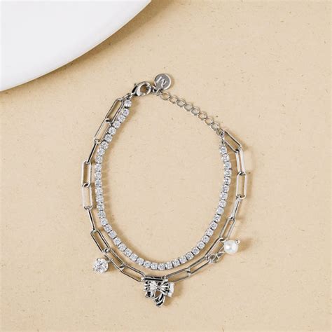 Jewellery Online - Premium Stone Studded Silver Bow Charm Bracelet ...