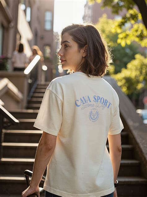 Cream Cava Sport Oversized Printed Tee - Women – CAVA Athleisure Pvt Ltd