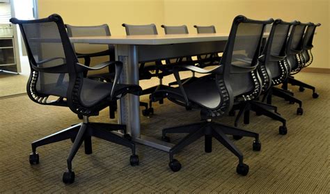conference room chairs with wheels and arms