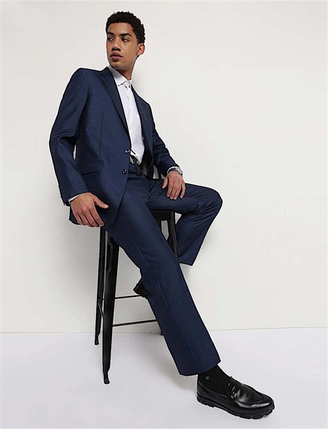 Buy Mid Rise Textured Trousers at Marks & Spencer