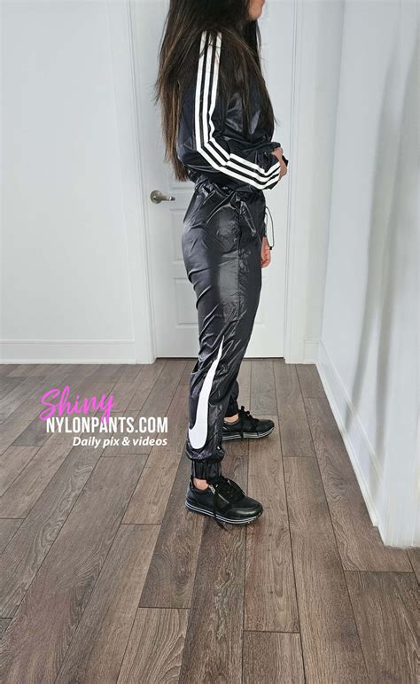 women in rainwear - Shiny nylon pants