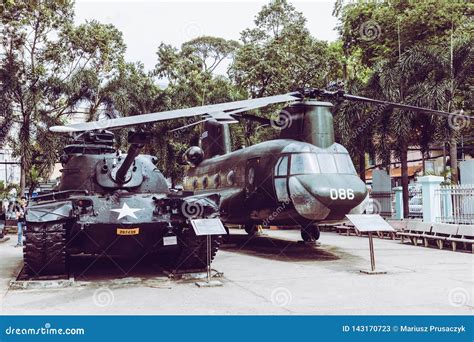 HO CHI MINH , VIETNAM- NOVEMBER 23, 2018 : Ancient Helicopter and Tank ...