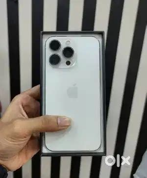 Selling my 4 months old I phone 14p in white colour/.Need urgent money ...