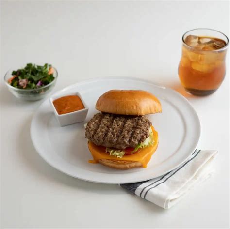 AdvancePierre™ Fully Cooked Flamebroiled Beef Patties with Onion