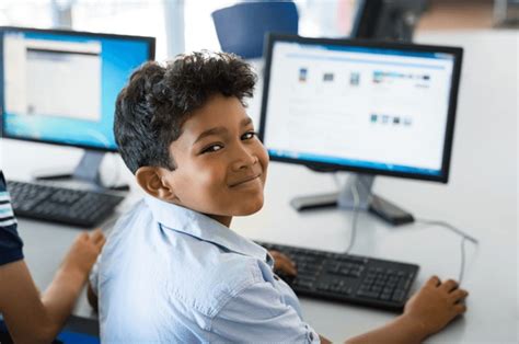 Boy Using Computer 的图像结果