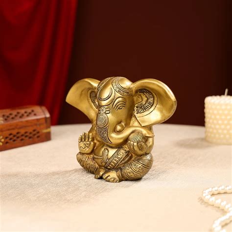 Gold Toned Lord Ganesh Brass Idol In A Sitting Posture – Ethnic India ...