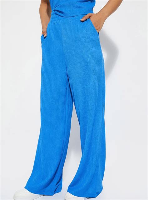 Buy URB_N Women Textured Knit Wide Leg Trousers Online at just Rs. 899. ...