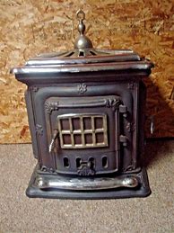 Image result for Antique Cast Iron Parlor Stoves for Sale