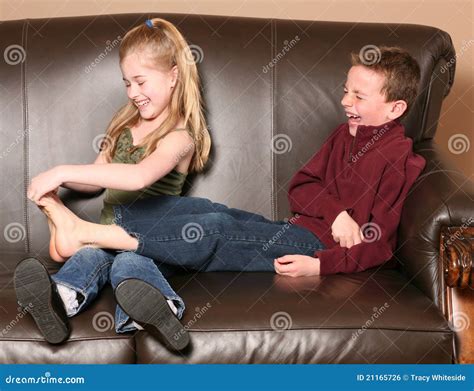 Children tickling feet stock photo. Image of people, brother - 21165726