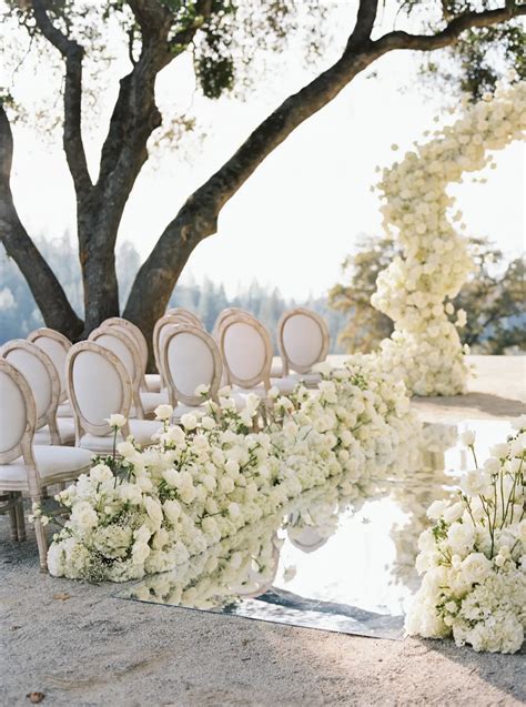 Infinite Reflections: A Stunning Mirrored Ceremony with White Roses ...