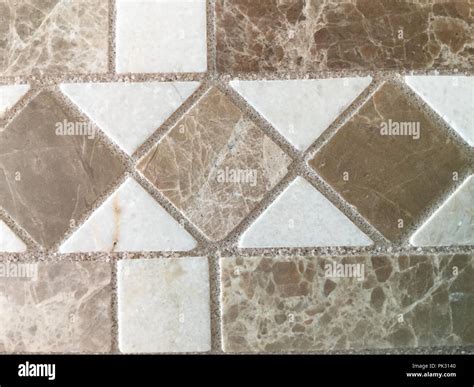 Diamond shaped decorative tiles, brown Stock Photo - Alamy