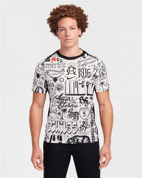 Maglia da calcio pre-partita a manica corta Nike Dri-FIT Club America ...