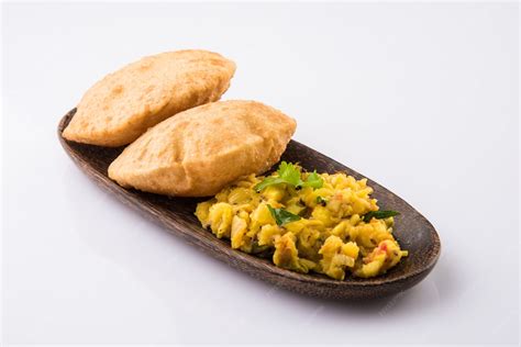 Puri bhaji - indian semi dry potato spicy recipe also known as batata ...