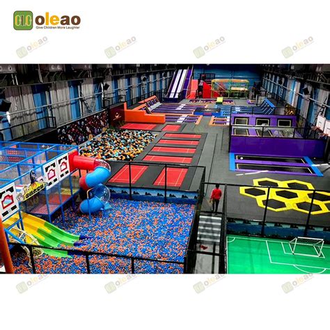 Thrilling Indoor Trampoline Park with Climbing Walls and Slides ...