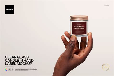 Free Clear Glass Candle Jar in Hand Label Branding PSD Mockup | Creatsy®