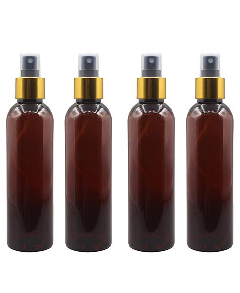 Pharcos 200Ml Amber Plastic Bottle With Golden Metallic Collar Black ...