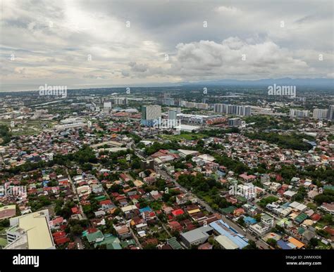 Modern city with villages in riverside. Iloilo City. Panay Island ...