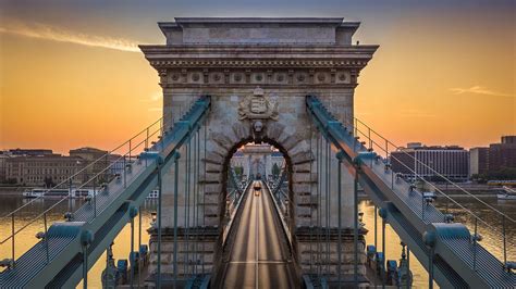 The Széchenyi Chain Bridge over Danube River at sunrise, Budapest ...