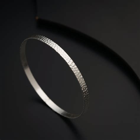 Buy Handcrafted Hammered Silver Bangle at House of Aadyaa
