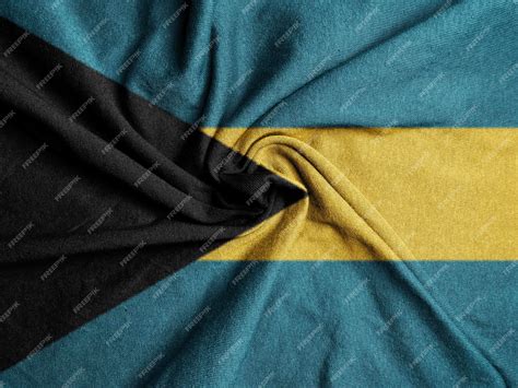 Premium Photo | Fabric flag of the bahamas national flag of the bahamas