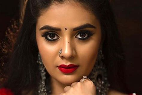 Tollywood star Sreemukhi poses with legendary Pavan Kalyan from the ...