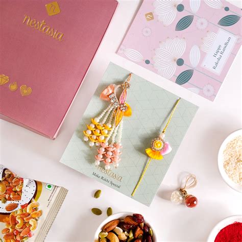 String Of Pearls Rakhi Lumba Hamper Set Of 4 With Gift Box And Card ...