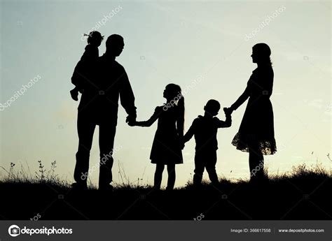 Family Of 5 Holding Hands Silhouette
