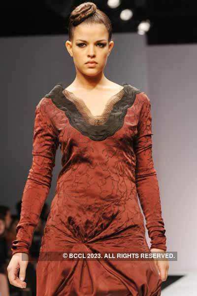 A model presents a creation by designer Ritesh Kumar Ridzyn during Day ...
